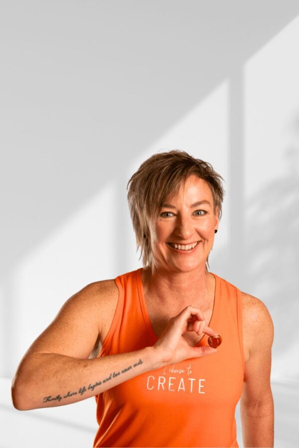 Create | Orange sleeveless activewear top for women - Image 2