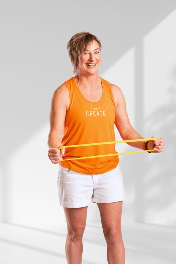 Create | Orange sleeveless activewear top for women - Image 4