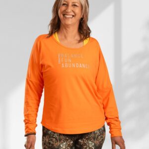 Creating | Orange long sleeve activewear top for women