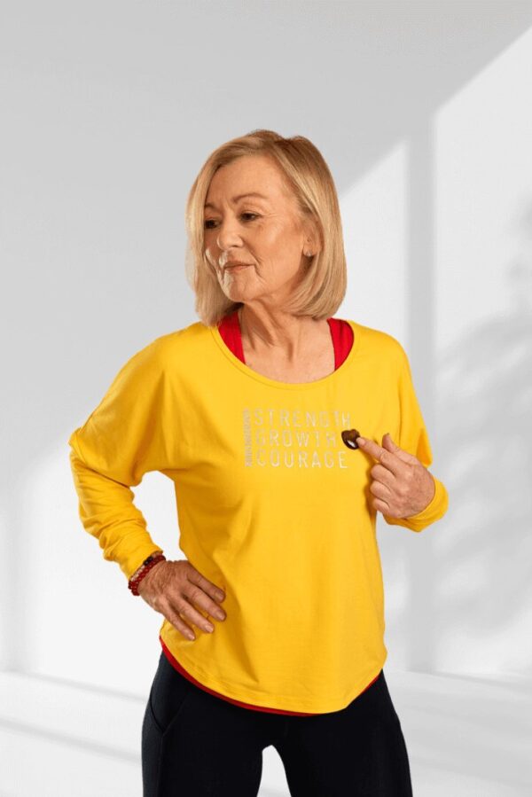 Empowering | Yellow long sleeve activewear top for women - Image 2