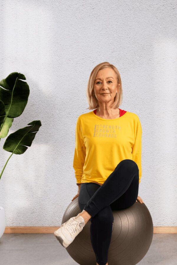 Empowering | Yellow long sleeve activewear top for women - Image 3